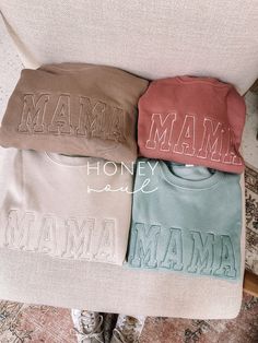 "Neutral Embroidered MAMA Lightweight Sweatshirt This cozy fleece lined sweatshirt makes a great gift for any mama or mama to be! Color: Tan, Dust, Mauve, Dusty Blue (see photos for colors shown) Fit: Unisex, Fits loose/relaxed (SEE SIZE GUIDE IN PHOTOS) Sizing: S,M,L,XL Material: ringspun 50% Cotton, 50% Polyester *this is a LIGHTWEIGHT sweatshirt; it is not thick* Font of the embroidery will be as pictured & all letters will be automatically capitalized (this cannot be changed).  Thread color for embroidery will have more of a monochromatic look to match the color sweatshirt. *Thread color CANNOT be changed* This item has LIMITED customization requests You may request customization within these limits: -ONLY ONE WORD -Must be a short word like (MAMA, DADA, AUNTIE, WIFE, WIFEY, BRIDE, BAB Oversized Embroidered Sweatshirt For Loungewear, Relaxed Fit Sweater With Letter Embroidery For Loungewear, Cozy Cotton Sweatshirt With Embroidered Text, Cozy Long Sleeve Tops With Letter Embroidery, Loungewear Sweater With Letter Embroidery And Relaxed Fit, Cotton Loungewear Sweater With Embroidered Text, Embroidered Text Sweatshirt For Loungewear, Fall Sweatshirt For Loungewear With Embroidered Text, Fall Loungewear Sweatshirt With Embroidered Text