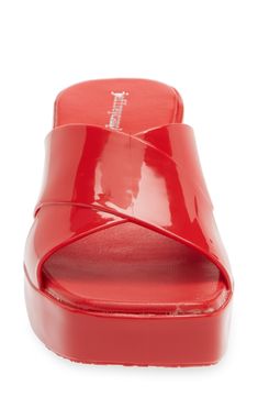 A lofty block heel and platform bring '90s-inspired vibes to a chic slide sandal finished with a square toe box. 2 1/4" heel; 1" platform (size 9) Synthetic upper, lining and sole Imported Women's Shoes Modern Summer Heels With Red Sole, Modern Red Platform Heels, Modern Red Heels For Summer, Red Sandals With Deep Heel Cup For Spring, Girl Money, 90s Inspired, Color Rojo, Sandal Women, Jeffrey Campbell