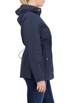 Long commutes and travels abroad are a breeze in an entirely packable rain jacket topped with a protective hood and shaped with a nipped-in drawcord waist. 29" length Front zip closure Drawcord-toggle hood Front snap-welt pockets Drawcord-toggle waist 95% polyester, 5% nylon Machine wash, line dry Imported Windproof Hooded Raincoat For Travel, Solid Weatherproof Windbreaker For Travel, Windproof Nylon Travel Raincoat, Hooded Windproof Raincoat For Travel, Travel Weatherproof Windbreaker, Nylon Raincoat For Travel During Rainy Season, Weatherproof Hooded Raincoat For Travel, Hooded Weatherproof Raincoat For Travel, Travel Raincoat With Adjustable Hood