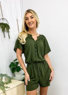 The EMES SHOP romper is detailed with a classic v neck line. Features solid color. button front design. short sleeves. drawstring waist. and loose fit. Pair it with a fedora hat and boots for a chic look.MATERIAL:95% Polyester 5% SpandexMEASUREMENTS: Product Length 34.5"-36"in 4-6-Small | Waist: 25"-26.5"in | Chest: 33"-34.5"in | Hips: 33.5"-35"in 6-8-Medium | Waist: 26.5"-28"in | Chest: 34.5"-36"in | Hips: 35"-36.5"in 8-10-Large | Waist: 28"-29.5"in | Chest: 36"-37.5"in | Hips: 36.5"-38"in... Casual V-neck Jumpsuits And Rompers With Button Closure, Casual V-neck Jumpsuit With Button Closure, Casual V-neck Jumpsuits And Rompers With Buttons, Short Sleeve Romper, Jumpsuits And Romper, Jumpsuit Fashion, Sleeved Romper, Fedora Hat, Small Waist