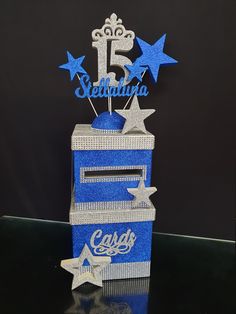 a blue and white box with some silver stars on the top that says 15 seltunta