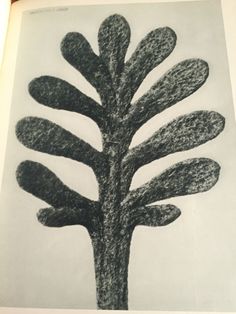 a black and white drawing of a tree