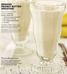 an iphone photo of two glasses of milk and bananas in the background, with text reading banana peanut butter smoothie