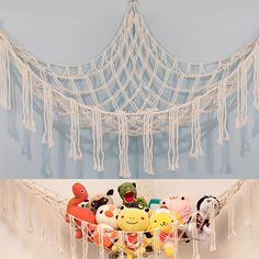 a hammock filled with stuffed animals on top of a white floor next to a blue wall