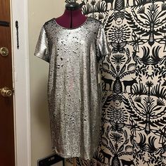 New With Tags. Pull On Style Sequin Dress. Hits Above The Knee. Low Back Hits Below The Bra. Reversible Sequin, One Side Silver Other Side Black. Fits Size 14 Forever 21 Short Sleeve Mini Dress For Party, Silver Short Sleeve Dress For Night Out, Forever 21 Glamorous Sequin Dress, Glamorous Sequin Dress By Forever 21, Style Sequin Dress, Black Fits, Low Back, Xl Dress, Above The Knee