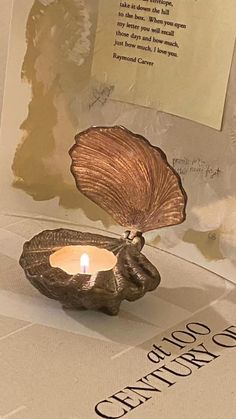 a candle that is inside of a shell