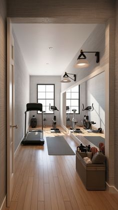 an empty gym with treadmills and exercise mats