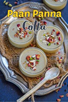 the best paay panna cota recipe on a silver tray with spoons