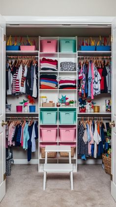 an organized closet with clothes and baskets on the bottom shelf, drawers in pink, green, blue, and white