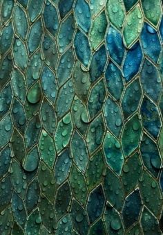 water drops on the surface of a mosaic tile wallpapered with green and blue colors