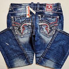 Rock Revival Clyde Distressed Straight Leg Jeans. (Last Pair) Authentic. Men's Size: Waist 40x32 Inseam. Rise: 11.5in. Bottom Leg Width 9.5in. Color: Medium Blue. Materials: 99% Cotton; 1% Elastane-Stretch. Cut: Straight. Details: Single Button Zip Front. (6) Pockets. Embroidered. Heavily Stitched. Nwt In Package. No Flaws. No Trades. ~Please Ask For Additional Information~ Rock Revival Jeans Mens, Distressed Straight Leg Jeans, Adidas Track Suit, Brown Jeans, Jean Pockets, Rock Revival Jeans, Compression Pants, Jeans Rock, Embroidered Jeans