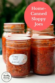 four jars filled with homemade canned sloppy joes