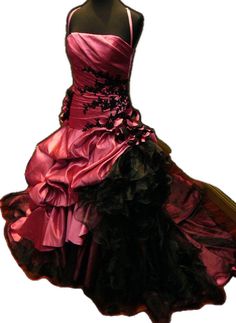 a pink and black dress is on display