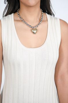 Want to incorporate a little gold into your accessories... this necklace is perfect for you. With the silver, beaded chain and the gold heart, this necklace is the pendant that is waiting for you. 16 inch chain 3 inch extender Heart Bead Chain Necklace With Heart Pendant, Silver Heart Necklace With Pearl Chain, Heart Shaped Metal Jewelry With Beaded Chain, Heart-shaped Metal Beaded Chain Jewelry, Silver Pearl Chain Necklace For Valentine's Day, Silver Necklace With Pearl Chain For Valentine's Day, Valentine's Day Silver Necklace With Pearl Chain, Silver Heart-shaped Beaded Necklace, Silver Heart Necklace With Pearl Chain For Valentine's Day