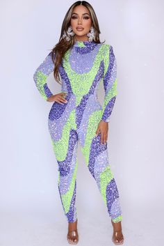 Feel confident and stylish with this vibrant Savvy bodysuit. Its bold sequins and shoulder pads give it a sophisticated yet playful look, while the cozy material ensures all-day comfort. Perfect for adding a pop of color to your closet! - Multicolored sequins - Mock neck - Long sleeve - Zipper in the back - Sequins print placement may vary. Each bodysuit is unique - Stretch 3/5 - Lining Please note: That CUSTOMIZED ITEMS CANNOT BE CANCELED OR RETURNED. Custom fee will apply apply. Please check e Green Long Sleeve Jumpsuits And Rompers For Party, Green Long Sleeve Party Jumpsuits, Fitted Party Jumpsuit With Contrast Sequin, Sequin Stretch Jumpsuits And Rompers For Party Season, Fitted Jumpsuits And Rompers With Contrast Sequin For Party, Green Fitted Bodysuit For Winter, Fitted Contrast Sequin Jumpsuits And Rompers For Party, Winter Green Fitted Bodysuit, Glamorous Stretch Sequin Jumpsuits And Rompers