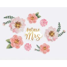 paper flowers with the words future mrs in gold lettering