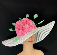 Gorgeous Kentucky Derby Ascot Hat              100% Brand New   Designed & Made in USA         Beautiful hand embellished wide brim hat adorned with green stripped coque rooster feathers and a large pink flower. Each flower is individually hand painted. Colors may differ slightly. This gorgeous hat has a 22.5 inches interior crown circumference.The Brim is 5 3/4 inches.It fits most!    Hat Base Color: White This is a high quality wide brim hat with wire which could hold it's shape.It won't flop in the eyes and face. And it will protect your face and hair from hot sun and wind. It's perfect for outdoor event. Would be great for Wedding, Bridal Shower, Tea Party, Concert,Evening Wear, Belmont,Ascot, Derby day,Races, Church, Art Photography,etc. ** This hat listing is currently Made to Order. High Crown Sun Hat For Spring Vacation, High Crown Hats For Spring, Spring Races Wide Brim Boater Hat, Spring Races Boater Hat With Wide Brim, High Crown Sun Hat For Spring Beach, Spring Races Sun Hat With Short Brim, Spring Boater Hat For Races, High Crown Sun Hat For Beach In Spring, Spring Beach Sun Hat With High Crown