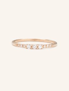 Turn the sparkle on with the Warm Solace Diamond Accent Ring. It's a modern take on the classic three-diamond ring. Crafted in solid 14K gold, this piece is made to last and is the perfect stackable piece to add to your collection. Classic 14k Gold Stackable Cluster Ring, Classic Stackable Cluster Ring In 14k Gold, Classic Gold Stackable Three Stone Rings, Classic Gold Three Stone Stackable Rings, Timeless Three Stone Ring In 14k Gold, Timeless 14k Gold Three-stone Diamond Ring, Luxury Three Stone Diamond Ring In 14k Gold, Fine Jewelry Stackable Three Stone Round Cut Rings, Timeless 14k Gold Diamond Stackable Ring