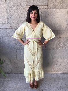 "Very rare Mexican dress, definitely a unique piece. zipper up. Made in 1970's Light Yellow pintuck cotton, you can see through it. Gorgeous details with lace. Fits size Small Measurements taken flat: Armpit to Armpit 18 1/4\" Waist 15\" HIps 19\" Bottom hem width 33 1/2\" Shoulders to bottome hem 50 1/2\"" Festive Lace Maxi Dress, Festive Maxi Length Lace Dress, Festive Maxi Dress With Lace Work, Elegant Yellow Dress With Chikankari Embroidery, Festive Lace Work Maxi Dress, Spring Lace Work Maxi Dress, Summer Anarkali Maxi Kaftan, Summer Anarkali Style Maxi Kaftan, Traditional Lace Maxi Dress