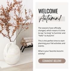 a white vase sitting on top of a table next to a wall with autumn leaves in it