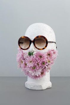 By Sara Hillenberger  it's a flower beard. Sarah Illenberger, Flower Beard, Fashion Eye Glasses, Creative Display, Shop Window Design, Shop Window Displays, Through The Looking Glass, Heads Up