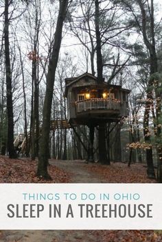 a tree house in the woods with text overlay that reads things to do in ohio sleep in a treehouse