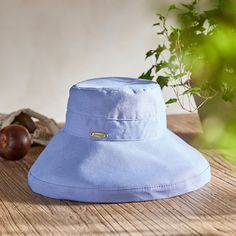 Handmade from lightweight and breathable cotton, this colorful crusher hat is perfect for a day at the beach or in the garden. Packable construction pairs with UPF 50 sun protection and an inner drawstring to assure a comfortable fit. Adjustable Cotton Sun Hat With Short Brim, Adjustable Short Brim Cotton Sun Hat, Adjustable Cotton Sun Hat With Brim, Adjustable Cotton Bucket Hat With Uv Protection, Cotton Sun Hat With Curved Brim, Curved Brim Cotton Sun Hat, Adjustable Cotton Sun Hat With Uv Protection, Cotton Bucket Hat With Short Brim For Beach, Cotton Beach Bucket Hat With Short Brim