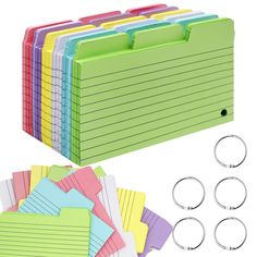 assorted colored file folders and ring binders