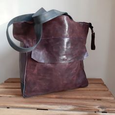 Aubergine large leather bag for women. Leather with a light texture, shaded. This is a natural nubuck leather. Handles navy blue. On the backe exterior zip pocket. Large outside pocket on the front. The bag is closed with a zipper. Zippered, inside lining,and zip pocket and 2 on phones. The bottom of the double leather. Big :) Height of 30 cm, the overall width of 46 cm at the top. Handles 55 cm. I send all bags by UPS courier. The bag goes to the USA about 7 days, in Europe it takes about 5 day Purple Leather Tote Shoulder Bag, Purple Leather Shoulder Bag For Everyday, Everyday Purple Leather Shoulder Bag, Purple Leather Rectangular Hobo Bag, Purple Leather Satchel, Purple Leather Hobo Tote Bag, Purple Leather Hobo Bag For Travel, Soft Leather Purple Shoulder Bag, Everyday Purple Leather Bag