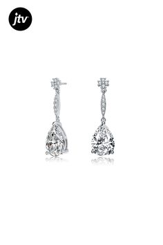 A large solitaire of clear pear Cubic Zirconia sits at the bottom of these drop earrings. These earrings also features a trail of small clear round Cubic Zirconia that is connected to the drop stone and the flower design round Cubic Zirconia post. These are set in Rhodium Plated over Sterling Silver and secured with a butterfly clasp.
measurement 27mm Silver Accents, A Butterfly, Flower Design, Rhodium Plated, Flower Designs, Pear, Cubic Zirconia, Dangle Earrings, Drop Earrings