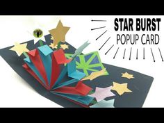 an origami pop up card with stars on it and the words star burst above it