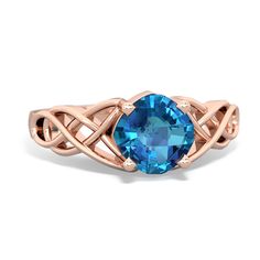 The beautiful and intricate curvy lines of this 14K Rose Gold london topaz Celtic knot ring symbolize no beginning, no ending, and the continuity of everlasting love or the intertwining of two souls. Celtic jewelry has long been known to use many symbols of love, but no style of Celtic jewelry carries as much meaning as the Trinity Knot. Rainbow Topaz Heart In Celtic Knot Ring, London Topaz, Alexandrite Jewelry, Celtic Knot Ring, Trinity Knot, Topaz Jewelry, Knot Ring, Rare Gemstones, Celtic Jewelry