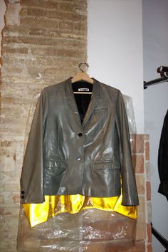 A close-up of the Jil Sander by Raf Simons SS 2012 leather jacket, showcasing its clean lines and luxurious leather finish. Vintage Designer Fashion, Contemporary Wardrobe, Modern Minimalism, Raf Simons, Vintage Designer, Jil Sander, Sleek Design, Vintage Designs, Designer Fashion