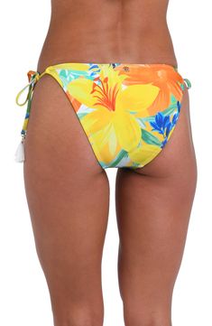 This bright and cheerful floral print has a summery vibe, perfect for a beach day. Leaving a little something to the imagination, adjustable side tie loops trimmed with tassels reveal just a hint of skin. The hipster cut flatters the hips with just enough coverage in back to keep the suit firmly in place. [split] Details Hipster Bottom Adjustable loop side ties Crochet trim White tassels Moderate coverage in the back Fabric 83% Nylon, 17% Lycra Elastane Summertime Vibes, White Tassel, Crochet Trim, Beach Day, Tassels, Floral Print, Split, Floral Prints, Trim