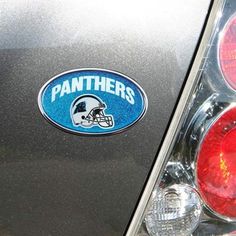 the chargers logo is on the tail light of a sports team's car in this image