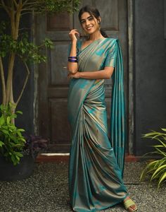 Type: Saree Saree Color: Teal Blue Blouse Color: Teal Blue Saree Length: 5.5 Mtrs Blouse Length: 0.80 Mtr Fabric: Lichi Silk Work: Zari Weaving Care Instruction: Hand Wash Product Code: 63399 Teal Blue Blouse, Grey Saree, Saree Sale, Unique Blouse