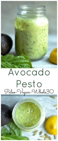 avocado pesto in a jar with basil leaves and lemons around it