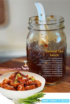 a jar filled with food sitting on top of a wooden table