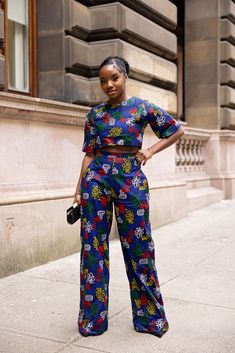 * Handmade Ankara trouser that can be worn both in summer and winter, styled casually or styled up depending on occasion. * Ankara High waist trouser with side pockets * Trouser has a flat front  waistband with elastic at the back and a wide leg. * This item is ready to ship. * Rush service also available, if you need the item by a particular day, please send me an etsy conversation. A copy of our size chat has  been added to photo collage, please check your size before placing your order, as we Palazzo Trouser And Top Ankara, African Print Tops Blouses, Trouser And Top For Ladies, Ankara Tops Blouses, African Print Crop Top, Ankara Crop Top, Ankara Trousers, African Print Jumpsuit, Ankara Jumpsuit