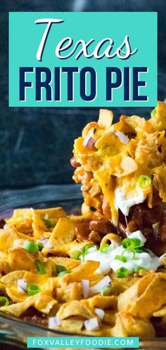 a close up of a plate of food with the words texas frito pie on it