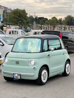 an electric car is parked in a parking lot