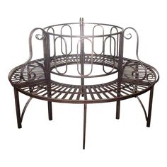 a round metal table with four trays on it's sides and an iron frame around the top