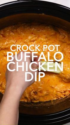 the crock pot buffalo chicken dip is ready to be served in the slow cooker