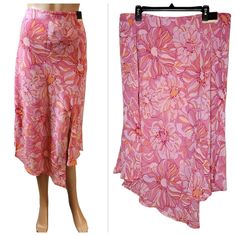 Lane Bryant Pink/Orange Floral Handkerchief Hem Midi Skirt. New With Tags Women's Plus Size 18/20. 2x Waist Flat Across Stretches From 18"-25" Lined 4 Slits 100% Polyester Displayed On My Xs 5'8" Mannequin Pink Barbie Barbiecore Plus Size Modest Church Dress Up Summer Flowy Stretch 3852 7.4oz Pink Flared Maxi Skirt For Spring, Pink Maxi Skirt For Spring, Pink Flowy Maxi Skirt For Spring, Flared Pink Maxi Skirt With Floral Print, Pink Flared Maxi Skirt With Floral Print, Fitted Pink Floral Print Maxi Skirt, Pink Lined Maxi Skirt For Spring, Fitted Pink Floral Maxi Skirt, Pink Asymmetrical Skirt For Spring