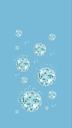 an abstract blue background with white and black balls in the air on top of each other