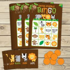 the safari animals bingo game is on display next to some pieces of orange and brown paper