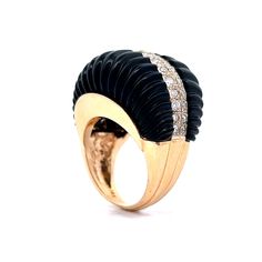 This magnificent cocktail ring is the perfect statement piece to make any outfit pop! Expertly crafted in 14 karat yellow gold and featuring a ridged black onyx stone, this modern piece of jewelry is a must-have. The diamonds are round brilliant cuts, weighing 1.04 carats with a clarity range of VS2 to SI1 and a diamond color of H. The diamonds are surrounded by a ridged black onyx, adding an extra level of contrast. Elegant Black Dome Ring With Polished Finish, Modern Black Rings For Evening, Luxury Black Onyx Diamond Ring, Black Onyx Stone, Shop Engagement Rings, Onyx Stone, Diamond Color, Cocktail Ring, Yellow Gold Rings