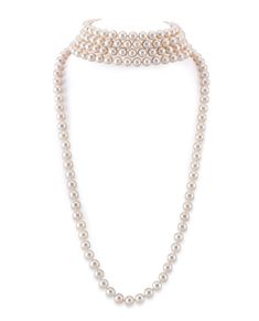 a white pearl necklace with two rows of pearls