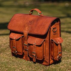 "The suave and classic leather large messenger bag, traditionally used to carry books is largely used for carrying laptops nowadays. The adjustable strap is an added advantage as it serves the purpose of a cross-body laptop bag as well as a shoulder bag. It is diagonally put across the body, with the bag hanging on the opposite hip. You can even ace up your office style by carrying it as a leather briefcase, for a more formal look. It has multipurpose central compartments as you can accommodate laptops as well as documents or files. The front small buckled pockets can be used for storing cardholders or keys. The medium-sized pocket can hold spectacles. This bag is made of the finest quality goat leather embellished with running stitches by contrasting threads. We offer excellent craftsmans Classic Shoulder Saddle Bag For School, Classic School Satchel In Soft Leather, Classic Soft Leather Shoulder Bag For School, Classic Soft Leather School Bag, Classic Rectangular Saddle Bag For School, Rectangular Leather Lined Laptop Bag For School, Classic Soft Leather Saddle Bag For Travel, Rectangular Soft Leather Saddle Bag For Travel, School Laptop Bag With Leather Lining