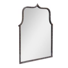 a mirror that is sitting on top of a table with a black frame and metal trim